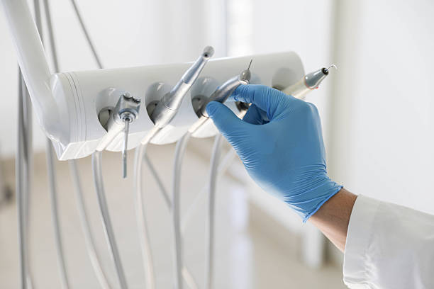 Professional Tooth Extraction technician working in Palm River-Clair Mel, FL